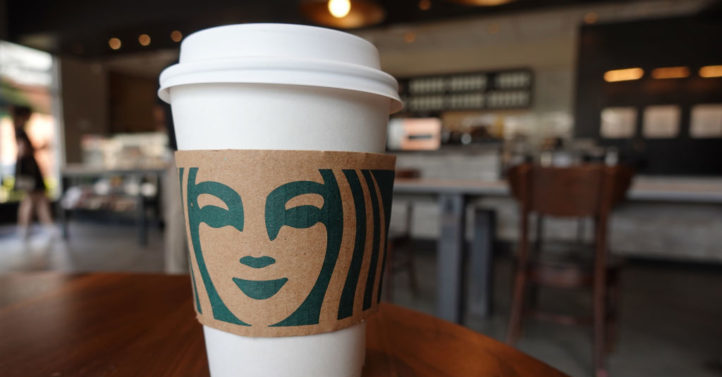 MIAMI, FLORIDA - JUNE 11: A Starbucks coffee cup sits on a table as the company reported supply shortages at some coffee shops on June 11, 2021 in Miami, Florida. The coffee chain said it had supply shortages for some items due to problems in the supply chain. (Photo by Joe Raedle/Getty Images)